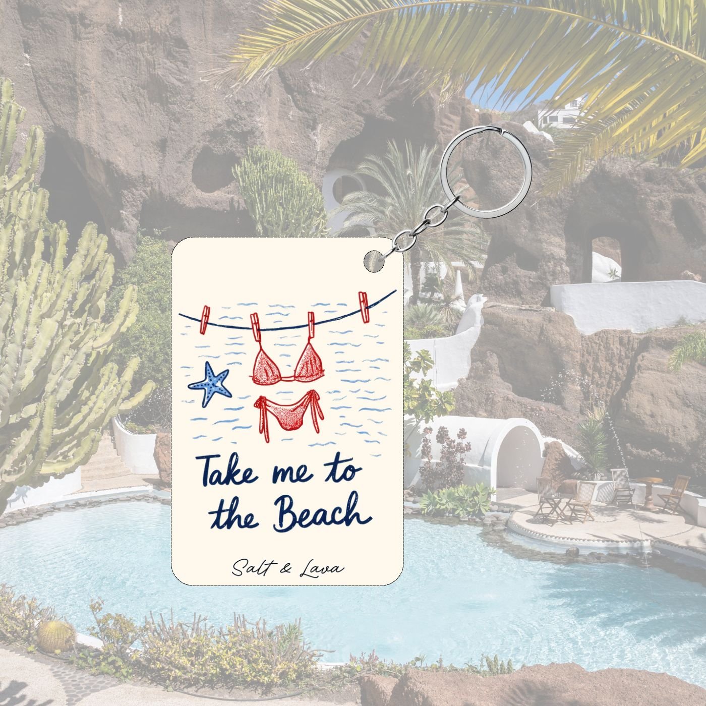 Cream keychain with a red bikini on a washing line over waves and the words Take me to the beach